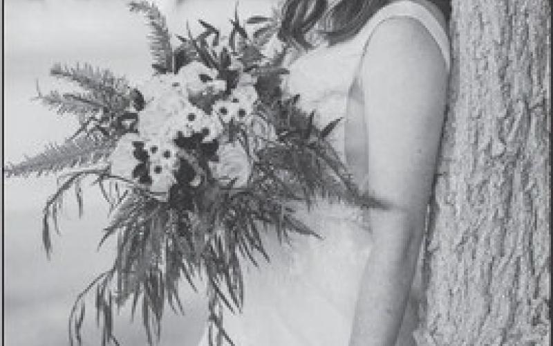 Mr. &amp; Mrs. Christian Lujan exchange wedding vows ..nee Elizabeth Greenhaw..