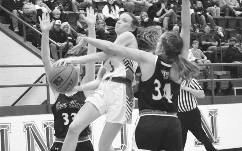 ATTACK THE RIM - Sundown Roughette Camry Jourden made the athletic finish at the basket to get the team some much needed points in the teams matchup against the New Home Lady Leopards. (Staff photo by Aalijah Soliz)