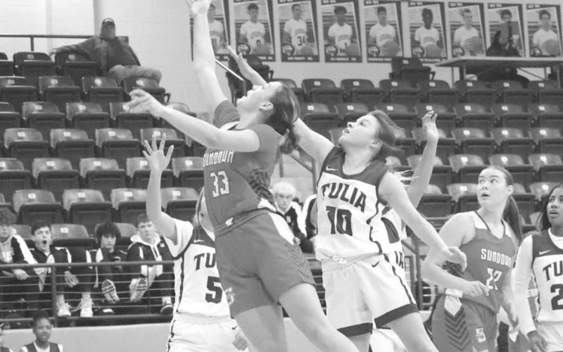 TOUGH DRIVE - Sundown Roughette Allie McCormick drove the ball down the middle of the defense last week at the Littlefield Tournament against the Tulia defense. (Staff photo by Aalijah Soliz)