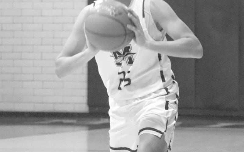 CHEST PASS - Morton Indian E.J. Rivas passed the ball to his teammate up the court in their contest against the Lubbock Titans this past Tuesday at home. (Staff photo by Aalijah Soliz)