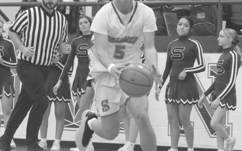ON THE MOVE - Sundown Roughneck Coen Navarez broke away on the fastbreak during the team’s district game against the Smyer Bobcats. The Ruoghnecks next game of the season is against the Levelland Lobos this Friday on the road. (Photo courtesy of Sundown ISD)