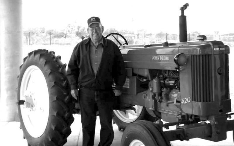 TRACTOR SHOW-- The 20th annual Antique Tractor Show will be held Friday, October 14 through Saturday, October 15, at the Fibermax Center for Discovery, hosted by the South Plains Antique Tractor Association. Admission is free; doors will open at 9 a.m. each morning. Raffle tickets are $5 each or five for $20. Pictured is raffle winner J.T. Drake of Ropesville, and his prize tractor. (Submitted Photo)