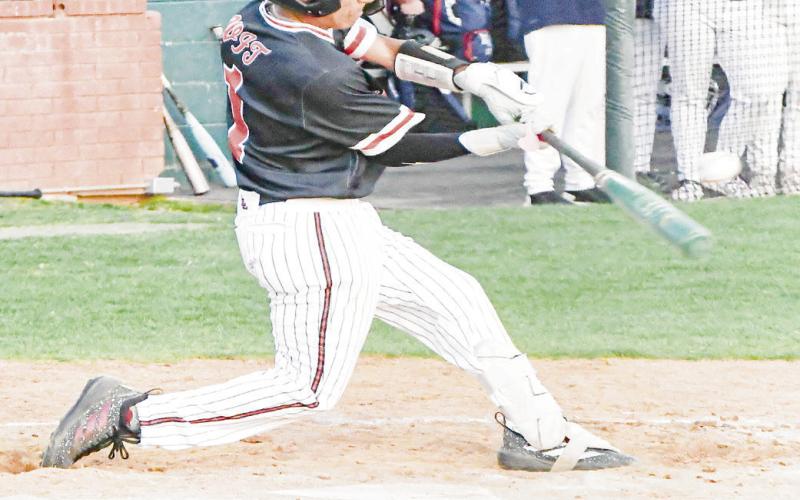 BARRELED UP - Levelland Lobo Javier Ruiz barrels up the ball during their district baseball game against Liberty this past Friday night at Levelland High School. (Staff photo by Jentezen Smith)