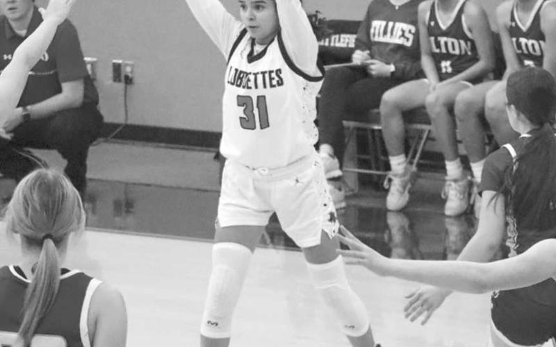 QUICK PASS - Levelland Loboette Leilani Sanchez passed the ball quickly to her teammates to spread out the Philly defense during the teams blowout win this Wednesday morning. (Staff photo by Aalijah Soliz)