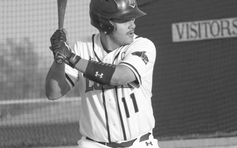 FOCUSED - Levelland Lobo R.J. Mireles was ready at the plate during the team’s game against the Lake View Chiefs last Friday at home for district play. (Staff photo by Aalijah Soliz)