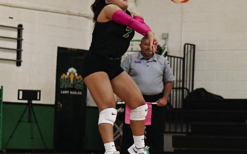 GET UP FOR IT - Marlee Molina jumps to make a play for Ropes varsity volleyball during a district match against Olton this past Tuesday. The Lady Eagles would go on to win 3-1. (Staff photo by Jentezen Smith)