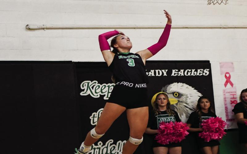 FLIGHT SERVICE - Lila Forsythe takes flight while making a serve for Ropes Varsity Volleyball during a match against district foe Olton this past Tuesday. The Lady Eagles would go on to win 3-1. (Staff photo by Jentezen Smith)