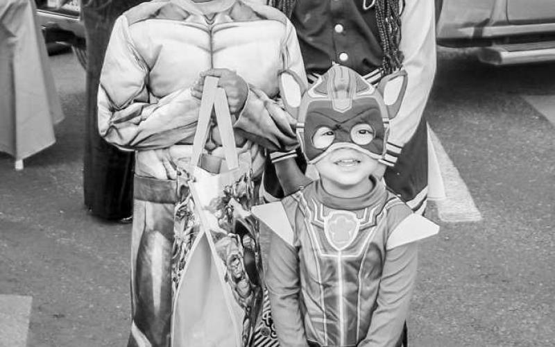 FAMILY TIME- Siblings Amaya and Amaje Mooring were Trunk or Treating with their cousin Jasper Gonzalez on Halloween this past Thursday on the square. They were having a great time and stopped for a quick photo before returning to the fun.(staff photo by Essence Childers)