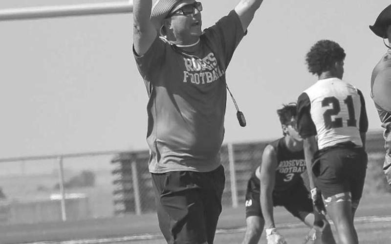 PLAYCALLING - Ropes Head Football Coach Beau Riker called plays form behind his quarterback during the team’s 7 on 7 game against Snyder this past Monday in New Home. (Staff photo by Aalijah Soliz)