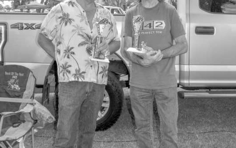 B.O.P MUSCLE CARS – The Thunder On the Plains Committee awarded winners of the B.O.P Muscle Class at the Thunder On the Plains Car Show at the Levelland City Park on Saturday. First place was awarded to Bill Verner, who entered a 1970 Pontiac Lemans Sport and second place went to Steve Light for his 1967 Oldsmobile 442. (Staff photo by Ada Niederhauser)