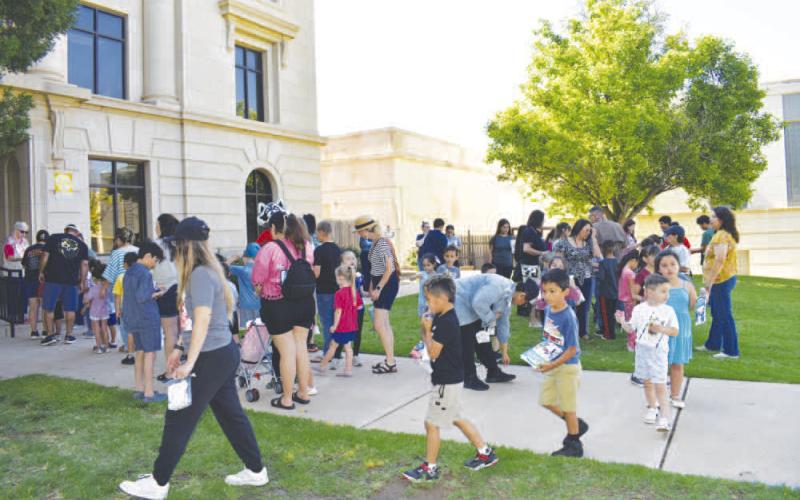 SEEDS AND SUN – Pictured are participants at “Eggsplore &amp;amp;amp; Grow” on Wednesday. The event, put on by Keep Levelland Beautiful, was part of the library’s summer reading program. (Staff photo by Ada Niederhauser)