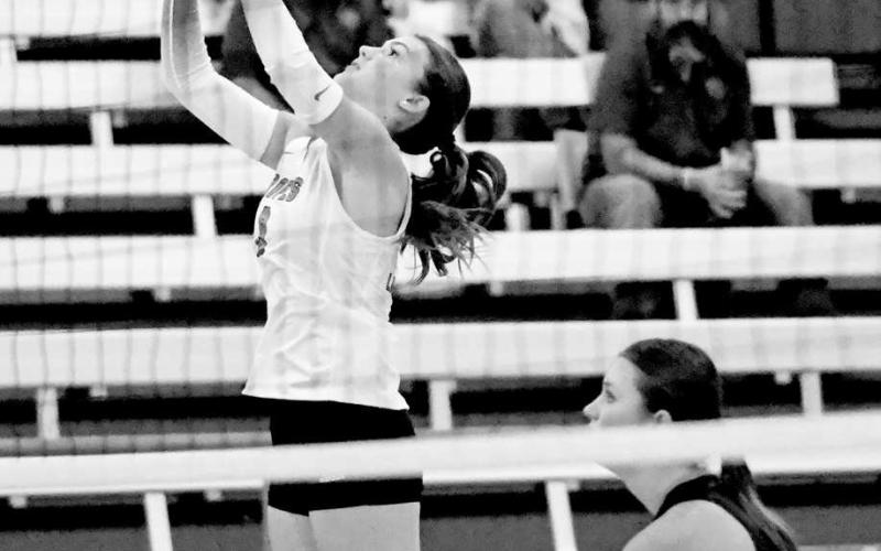 SEND IT OVER – Lady Eagle Brylee Lauderdale sent the volleyball over the net while Braedyn Reyna is ready to react during the match against Sterling City on August 12. The Ropes Lady Eagles opened the season at home. (Staff photo by Jentezen Smith)