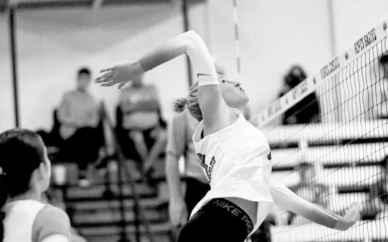 SPIKE IT – Lady Eagle Lily Greer went up for the spike during their opening volleyball match against Sterling City on August 12 at home. (Staff photo by Jentezen Smith)