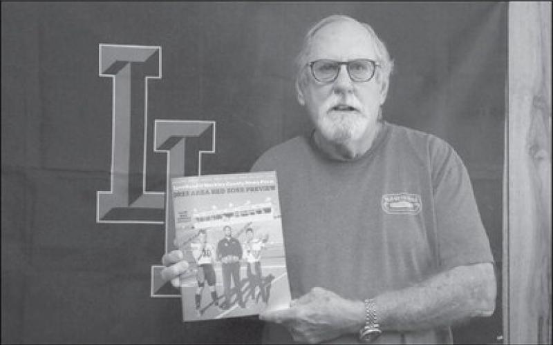 LEVELLAND MAGAZINE - Mike Winfield was one of the first customers of the day Friday to buy six magazines of the newly released 2023 Area Red Zone Preview. (Staff photo by Aalijah Soliz)