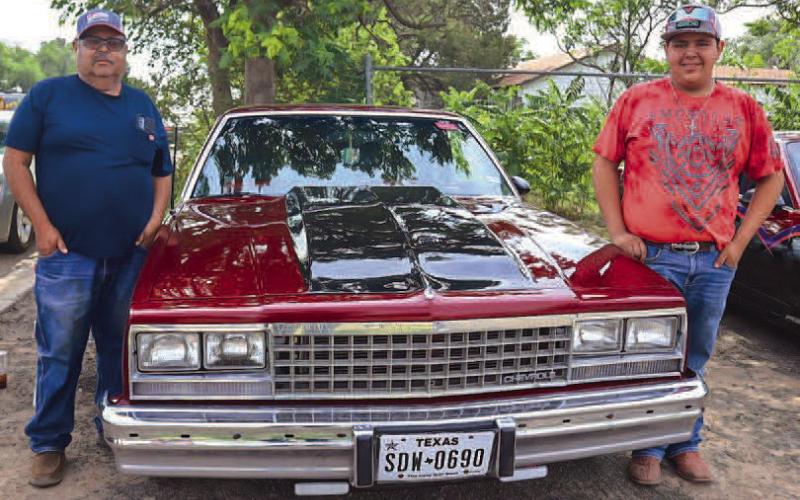 LOVE FOR CARS - During the 33rd Annual Juneteenth Celebration held June 16-17, the event included a car show that has seen more participation than in previous years. Pictured is Aiden Laguna with his 1983 Chevy El Camino. Under the hood the car has a 350 V8 small block engine. (Staff Photo by Aalijah Soliz)