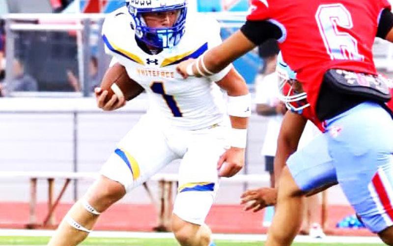 Whiteface Antelope Luke Gresham hunts for a hole as the New Deal defense bears down. (WCISD photo)