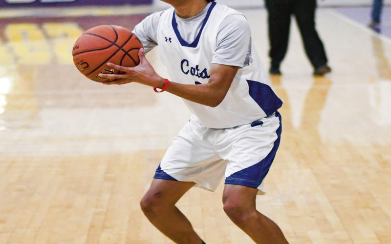 SPOT UP SHOOTER - Smyer’s Sebestian Rodriguez catches a pass and puts up a three pointer during their game against Wilson this past Thursday in Anton. (Staff photo by Jentezen Smith)