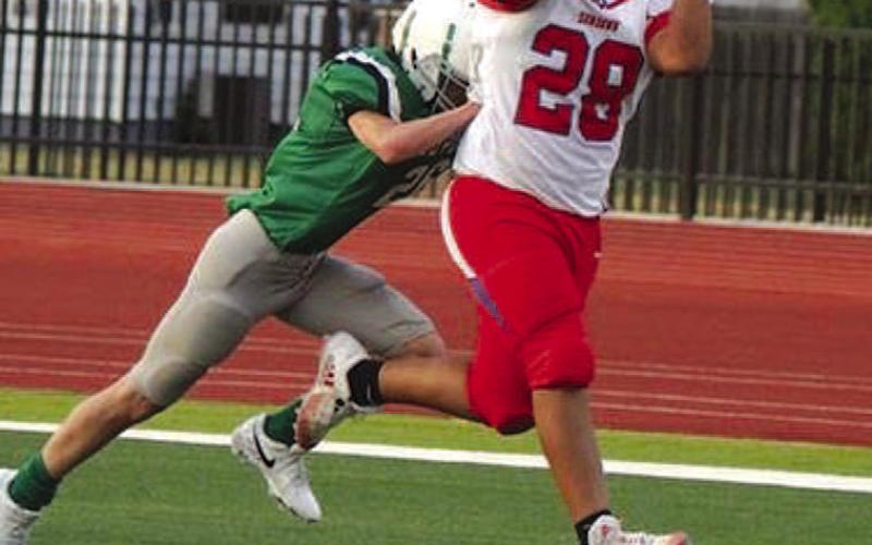 TOUCHDOWNGRAB- Sundown eighth grader, Andrew Rodriguez caught a dime thrown by Isaiah Igo to complete a Roughneck touchdown as the eighth graders battled Floydada to a 42-8 win. (Photo Courtesy of Sundown ISD)