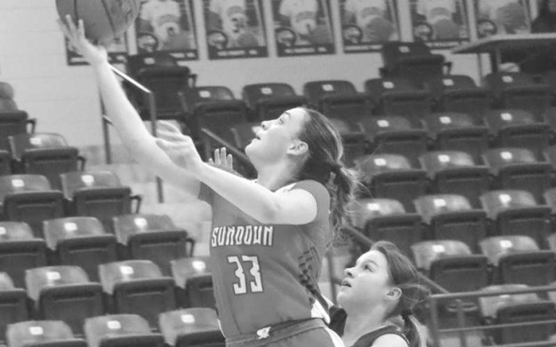 LAYUP - Sundown Roughette Allie McCormick layed the ball up during the teams contest against the Tulia Lady Hornets this past week at the Littlefield Tournament. (Staff photo by Aalijah Soliz)