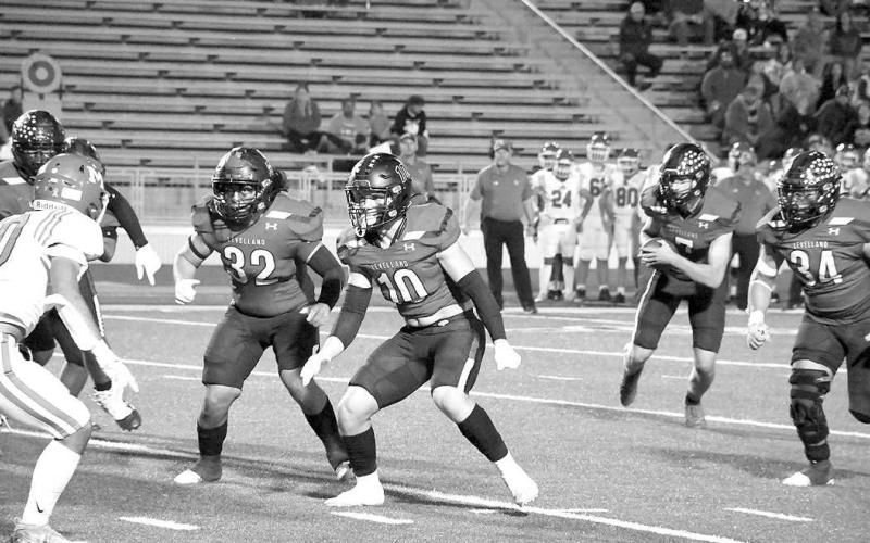 LOBOS COME UP SHORT- Facing off against the Monahans Loboes in the 4A-2 Bi-District round, the Levelland Lobos fell short of extending their season as they lost, 27-15, Thursday in Andrews. Pictured in the photo are: Rusty Johnson (10) Aiden Herrera (32), Marco Guillen (34) and Konner Alexander (7). (Staff Photo by Dom Puente)