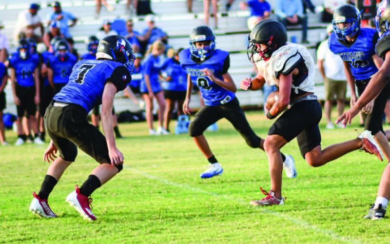 ONE-HANDED PICK – Whitharral Panthers senior outside linebacker Damian Rodriguez made the onehanded interception during a scrimmage last Friday at home against the Lubbock Titans and Nazareth. (Staff photo by Jentezen Smith)