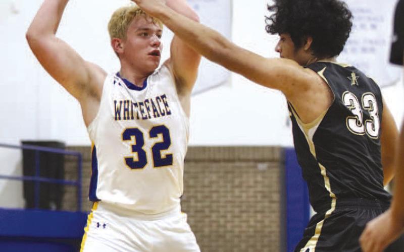 LOOKING FOR TEAMMATES- The Antelopes won the Way Out West Basketball Tournament in Whiteface over the weekend. Brighton Scoggins looked for an open teammate during the title game against Plains. (Photo Courtesy of Holly Crutcher)