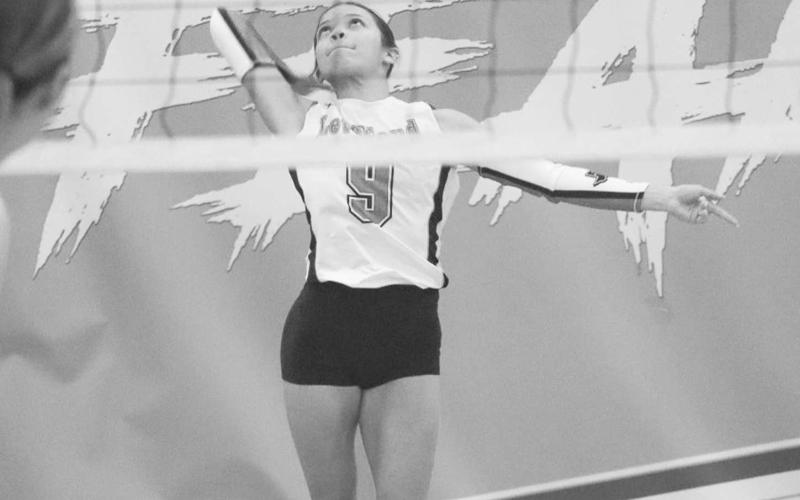 SERVE - Levelland Loboette Aubree Gaona served the ball during her team’s game against the Lake View Maidens on the road. (Staff photo by Aalijah Soliz)