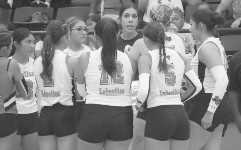 GAMEPLAN - Levelland Volleyball Coach Whitney Gibson talked to her Loboettes this past Tuesday during the team’s game against the Denver City Lady Mustangs for the season opener. (Staff photo by Aalijah Soliz)