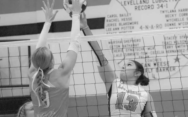 TIP OVER - Levelland Loboette Diana Roman tipped the ball over the defender this past Tuesday during the team’s season opener against the Denver City Lady Mustangs. (Staff photo by Aalijah Soliz)