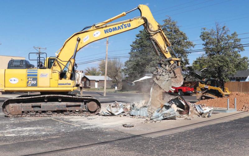 DEMOLITION TIME - Demolition began in the area of Sherman and Cactus Drive Thursday. The crew handling the job was tasked with tearing down the old gas pumps along with the overhead cover that had been unused for a long period of time. (Staff Photo by Shawn Franklin)