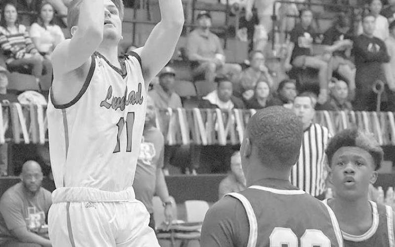 TOP SCORER-Levelland Lobos found themselves back in the win column after a competitive home stand against the Estacado Matadors, 58-52, Friday night. Carson Boggs led all Lobos in scoring with 14 points. (Staff Photo by Dom Puente)