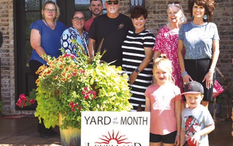 YARD OF THE MONTH - July Yard of the Month was awarded to Ricky and Desiree Huckeby by Keep Levelland Beautiful. Names in no particular order: Rick Huckeby, Desiree Huckeby, Jaine Morales, Kristal Isaack, Dona Wheeler, Kelly Handcock, Josh Meredith, Kynlie Greeson, Lukas Greeson. (Staff photo by Emily Campos)