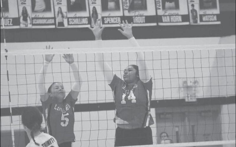 EFFORT - Levelland athletes Tanaesia Brackens and Allison Monge made the block on the defensive side of the ball. The Loboettes started district play this Saturday against a decent Sweetwateer team as the away team. (Staff photo by Aalijah Soliz)