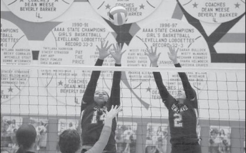 VERTICAL - Levelland Loboettes Taylyn Ledesma and Trinity Wafers went vertical to make it tougher on the Brownfield Lady Cubs in their dominant win this past Tuesday. (Staff photo by Aalijah Soliz)