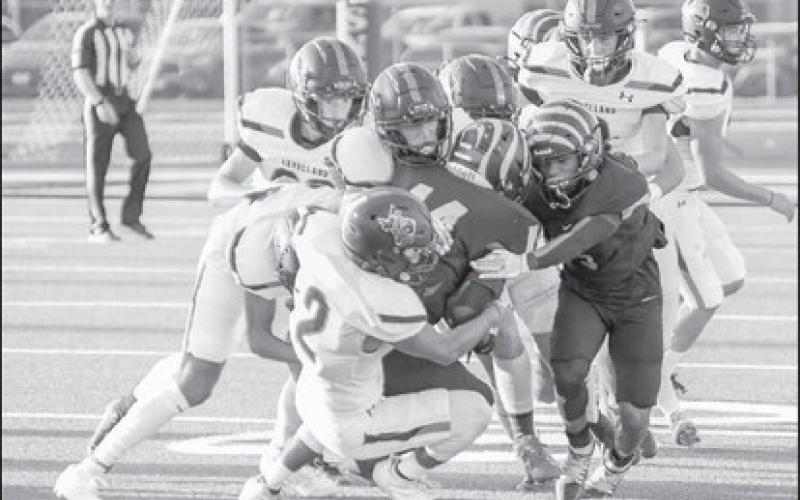 WRAP UP - The Levelland Lobos defense tried their best aginst a good Snyder Tigers team. The Lobos lost their away game 30-0, this past Friday night. (Staff photo by Dom Puente)