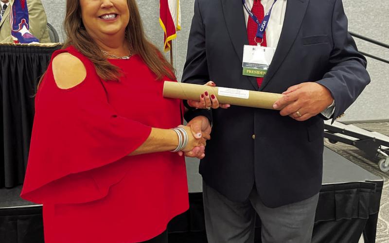 BIG HONOR - Hockley County Judge Sharla Baldridge accepted her Commissioners Court Advanced Curriculum Certificate of Achievement from Swisher County Judge Harold Keeter, 2022-23 president of the County Judges and Commissioners Association of Texas. (Submitted Photo)
