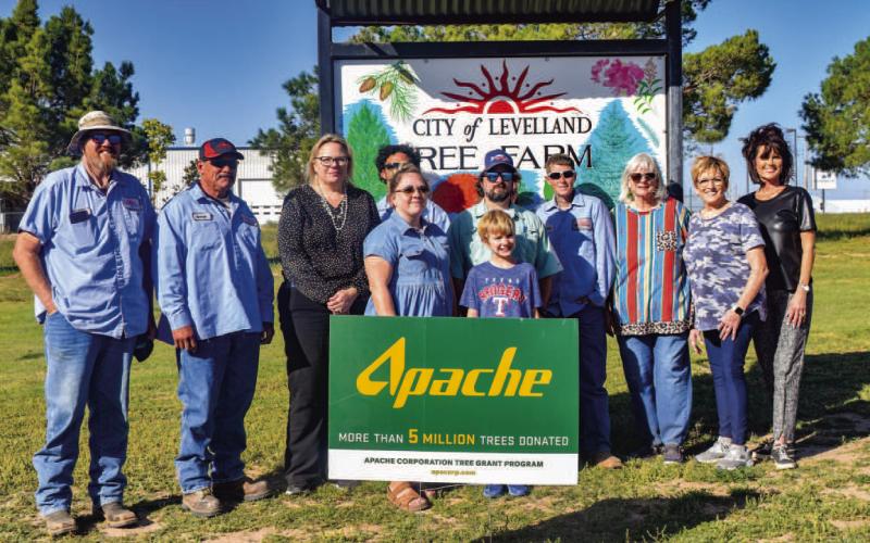 COMMUNITY TREE GIVEAWAY - It was a busy Wednesday for the volunteers handing out trees to the Levelland community Wednesday afternoon thanks to the Apache Tree Grant that Keep Levelland Beautiful received. Community members lined up along side the Levelland Civic Center to receive two free trees to plant themselves. Pictured from left to right are: Steve Golden, Juan Galvan, Kelly Hancock, Adrian Mellberg, Robert Pegues, Dustin and Atikas Reichelt, Shanna Davis, Donna Wheeler, Barbra Pinner and Cristal Issa
