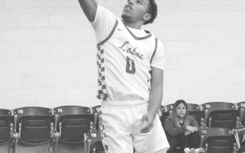 GREAT FORM - Levelland Lobo Jayden Castillo layed the ball up during the teams first game of the tournament Wednesday against the Hale Center Owls. (Staff photo by Aalijah Soliz)