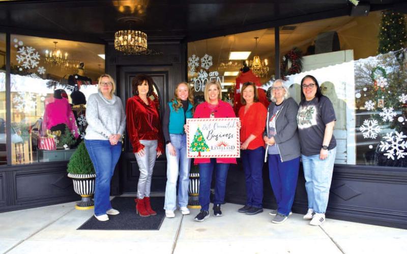BUSINESS WINNER - The Owner Of Studio- K was selected as the winner of Keep Levelland Beautiful annual Best Decorated Business of the month contest for the 2023 holiday season. Pictured from left to right Kelly Hancock, Cristal Issacks, Chole Carpenter, Kenna Trotter owner, Tammy Franklin, Donna Wheeler and Janie Morales. Awards were presented the week before Christmas.(Staff photo by Emily Campos)