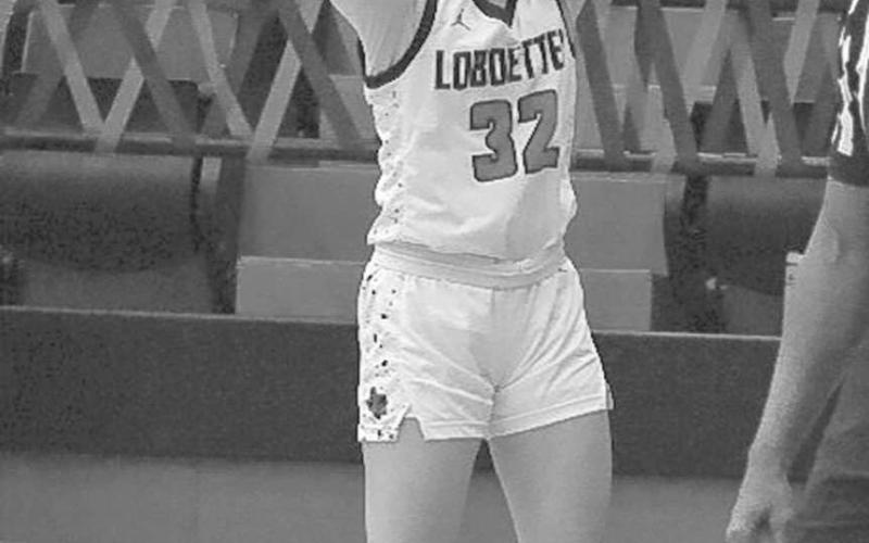 THREE - Levelland Loboette Emery Smith shot the ball during the teams game against the Lakeview Maidens this past Tuesday as the team became district champs for the fourth year in a row. (Staff photo by Aalijah Soliz)
