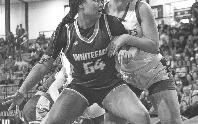 POST UP - Whiteface Lady Lope Tymmyah Olenga backed down the Nazareth defender in the paint during the team’s game against the Nazareth Swiftettes this past Friday. (Staff photo by Aalijah Soliz)