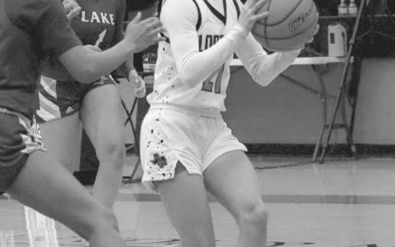 DRIVE - Levelland Loboette Carly Tienda drove the ball in the middle of the defense to get the team a good look on offense last Tuesday night. (Staff photo by Aalijah Soliz)