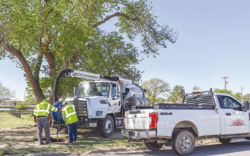 WATER LINE FISHING - The City of Levelland Public Works Department was busy Thursday morning fixing water line issues next to Lobo Lake. The small crew worked in the area quickly to remedy the issues. (Staff photo by Emily Campos)