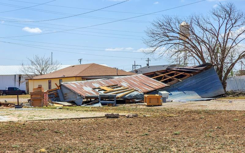 Road closures are expected to be held throughout Wednesday as large pieces of debris made its way onto roadways.