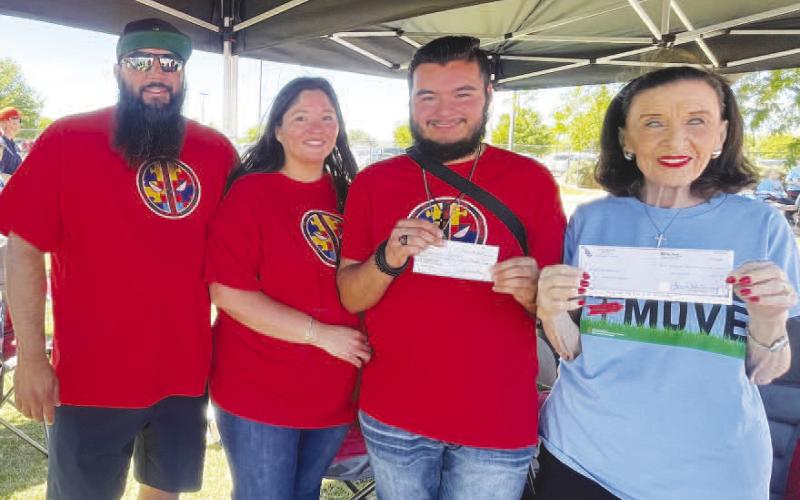 AUTISM AWARENESS - A check was presented for $900 from Levelland ABC as well as a personal check on behalf of the Lopez Family. Pictured is Jeremy Lopez, Jeanette Lopez and Zeth Lopez. They presented the check to Jere Lynn Burkhart at the Texas Tech Burkhart Center walk for Autism Awareness on April 28. Zeth Lopez is currently a senior at Levelland High School, he has applied and is looking forward to attending the Transition Academy at Texas Tech. (Photo courtesy of Jeanette Lopez)