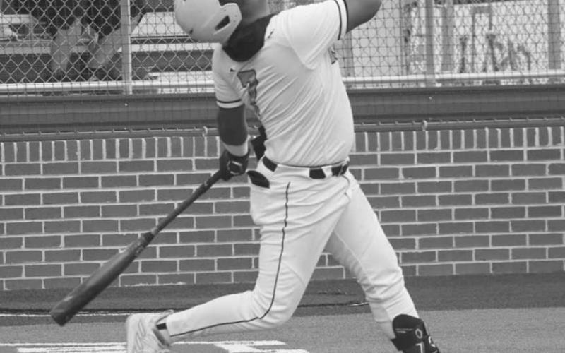 POP FLY - Ropes Eagle Elijah Flores hit a pop fly last Friday against the Clarendon Broncos in the team’s 1-0 win. (Staff photo by Aalijah Soliz)