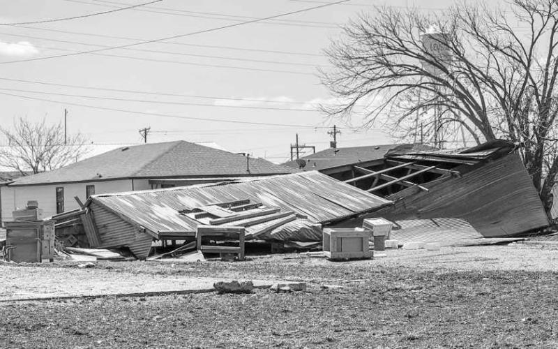 COLLAPSED BUILDINGS – Older buildings throughout Levelland took the brunt of the wind from Wednesday’s storm. Multiple older buildings with little structural rigidity were found collapsed where they once sat or in roadways blown over. Efforts to address major debris or structures in the roadways have been prioritized for resident travel. Pictured is a collapsed building on 3rd Street. (Staff photo by Dom Puente)