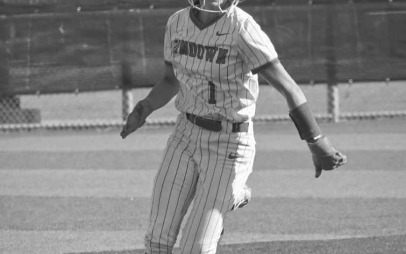 FULL SPEED - Sundown Roughette Breigh Gregory rounded third base during the team’s game against the Sunray Lady Cats in their dominant win. (Staff photo by Aalijah Soliz)
