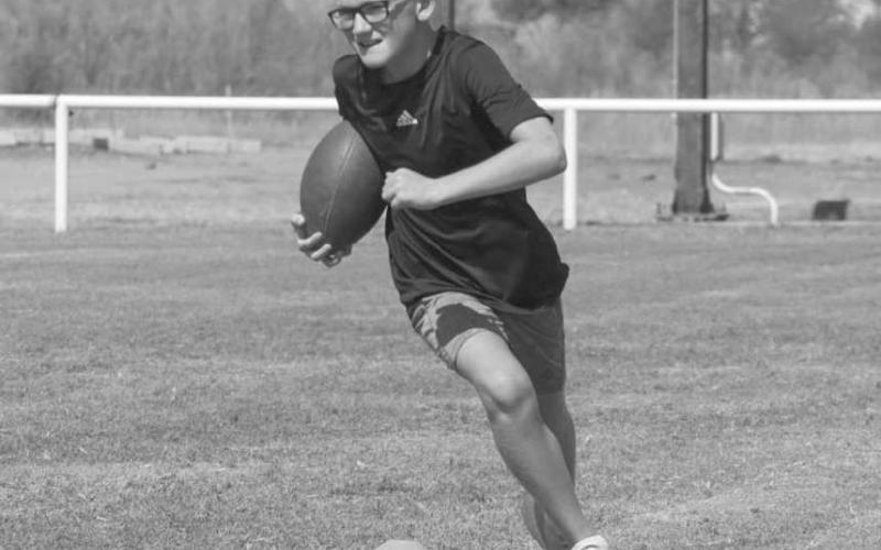 TURNING THE CORNER - Whitharral Panther Preston Prowell turned the edge on the cone this past Monday at the Whitharral Football Field during the Whitharral All-Sports Camp. (Staff photo by Aalijah Soliz)
