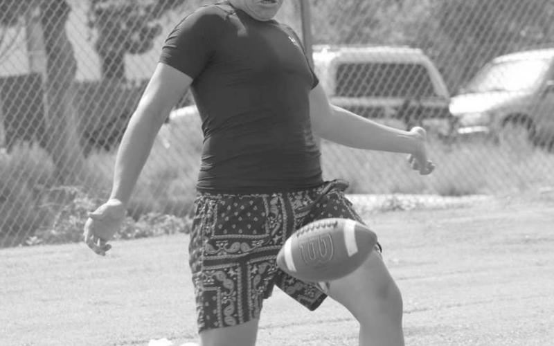 PUNTING - Morton athlete punted the ball during the Morton Football Camp to test what he could do this past Thursday. The Football Camp lasted from Thursday to Friday to teach kids the basics and improve on their skills over the summer. (Staff photo by Aalijah Soliz)